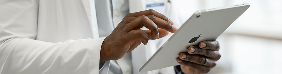 Clinician on tablet healthcare
