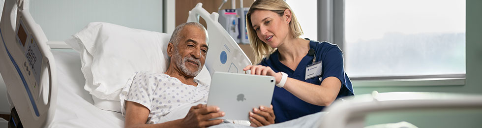 Patient and clinician on tablet healthcare
