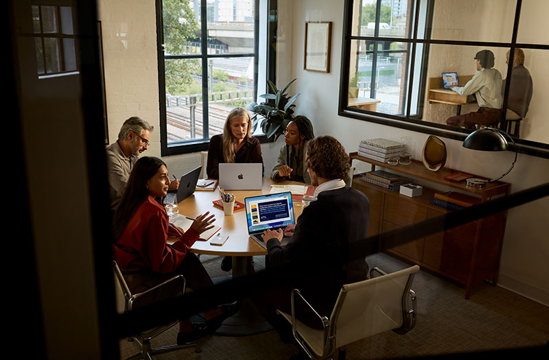 Team meeting with Apple devices