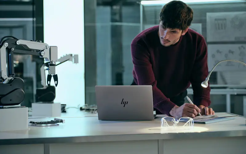 Girl on hp workstation.