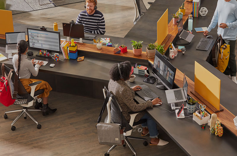 Logitech team in office personal desks