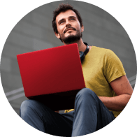 Public trader workign off laptop computer