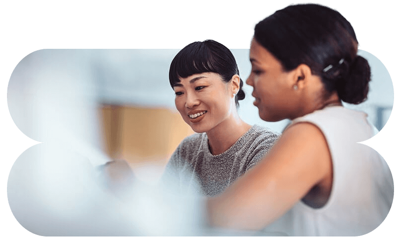 Close-up of collaboration in a modern office environment utilizing a private cloud