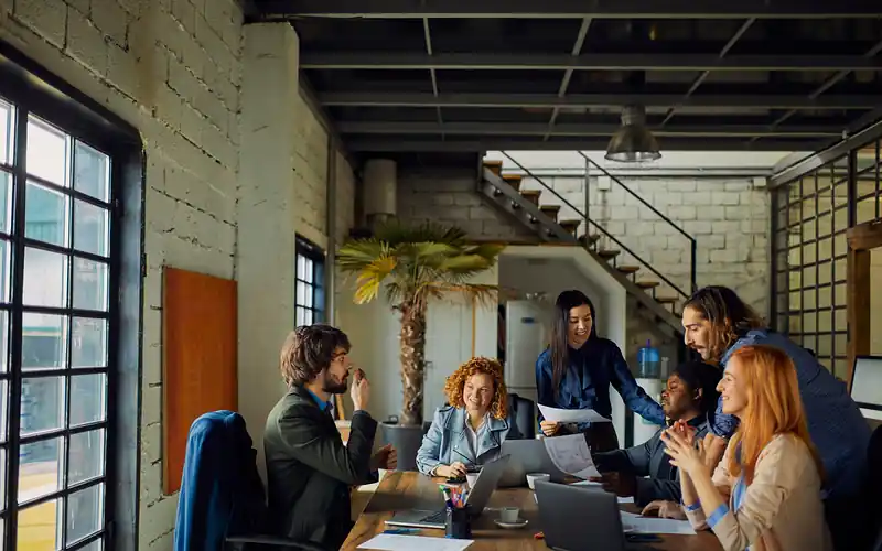 Business professional using automated workflows and self-service tools. 