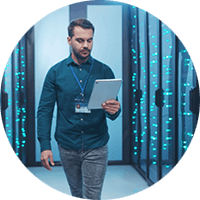 Man using a tablet in the server room