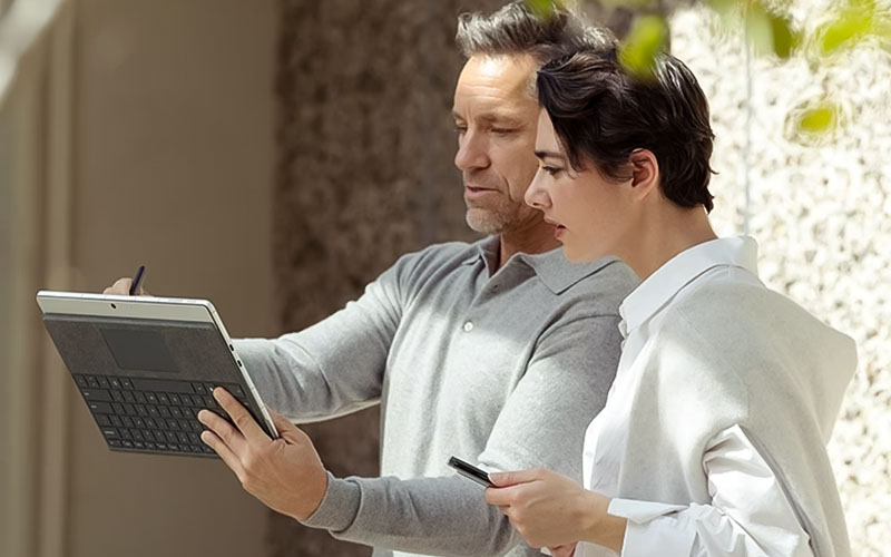 Employees using tablet