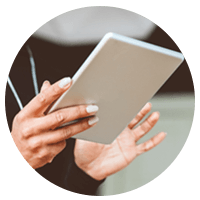 Close up of woman holding tablet device