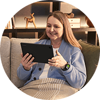 Female using a tablet at the sofa