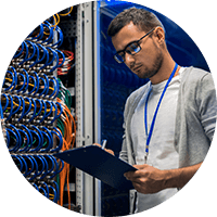 Man writing inside the data center