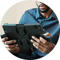 Man in polo using a tablet with WingoCase