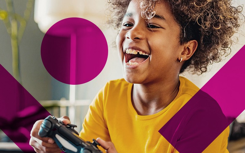 Inspire new ways to play young child playing video game