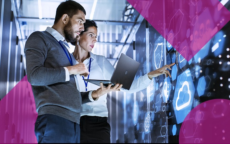 image of two workers using data center