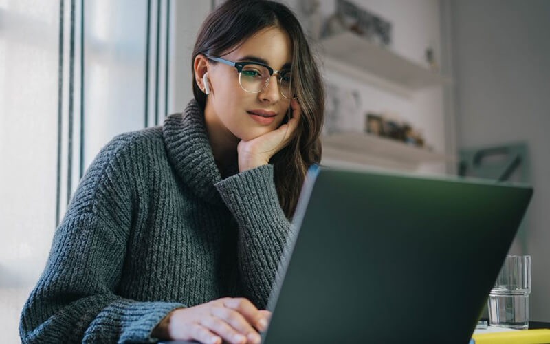 Person typing using a laptop