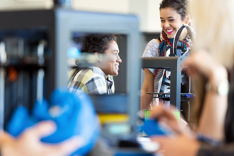 Always on the lookout for smart, technically minded people New recruits discuss project in modern office