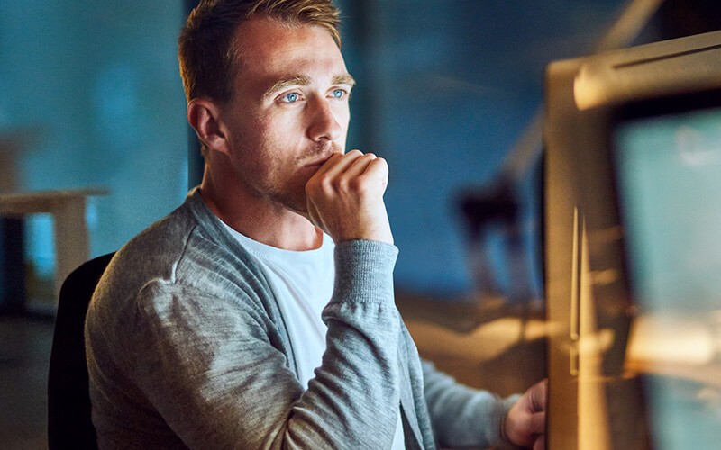 Work behind the scenes to ensure our website and e-commerce platform stay up to date IT developer reviewing code found on system database