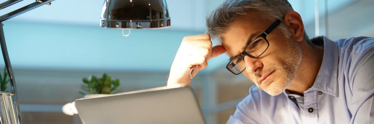 Which Type Is Right for Your Business? Business team in meeting collaborating with devices