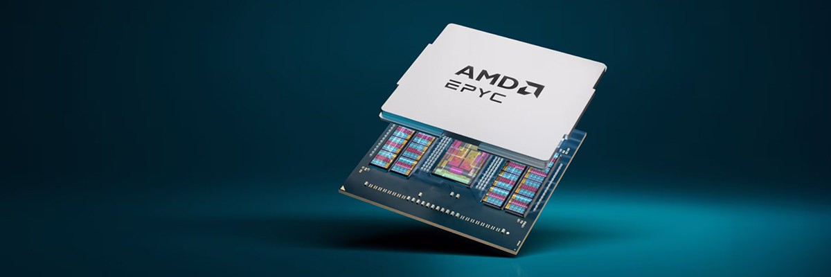 Woman on laptop with colleague