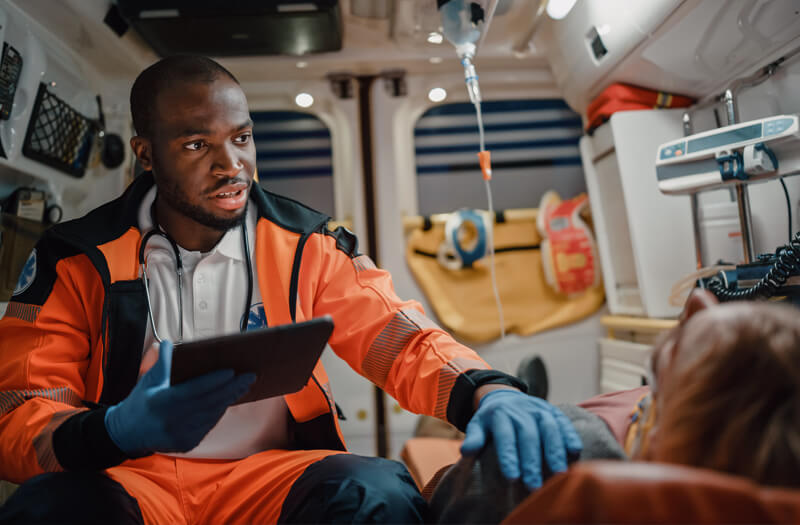Paramedic with a tablet