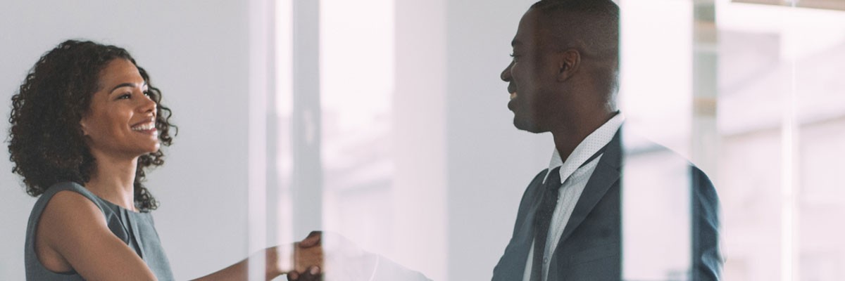 Manager greets new hire after career reboot