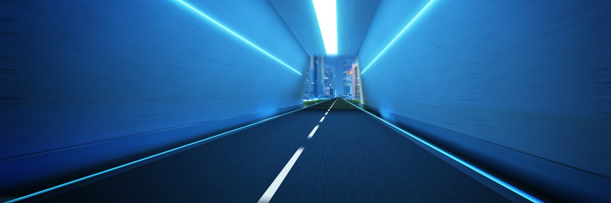 Do you have the right skills, processes and strategic partners to support the new business? Neon tunnel opening to view of modern city