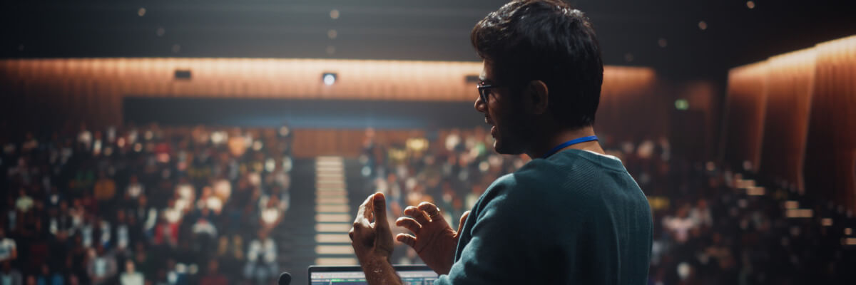 Man speaking at a press conference