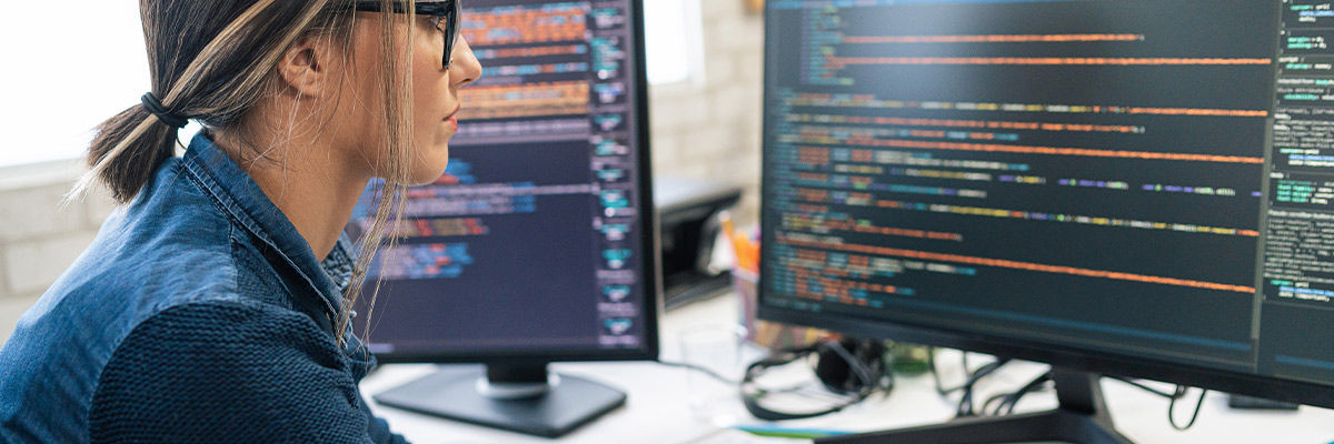 Person coding on the computer