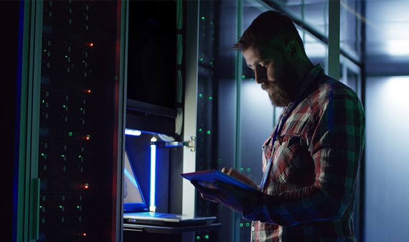 Man working in server room