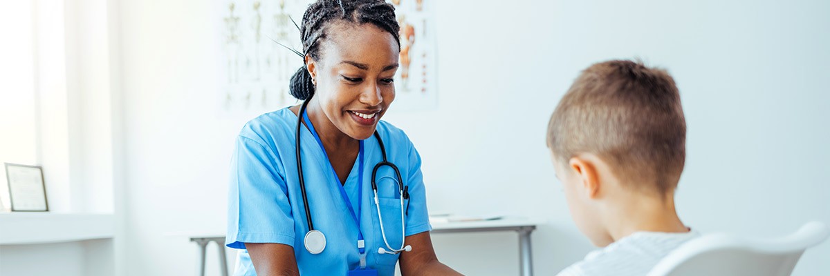 Healthcare working caring for child patient