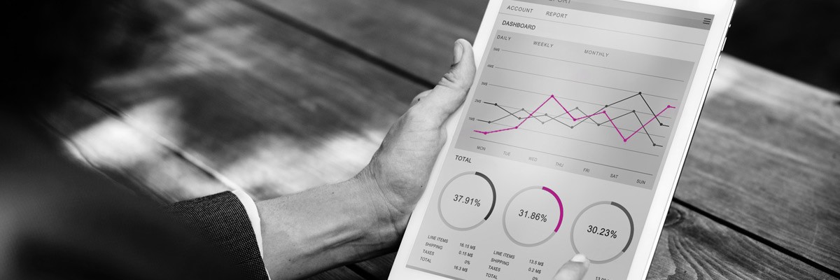 User looking at analytics displayed on tablet