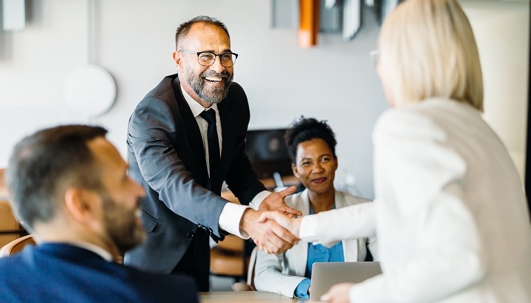 Business people smiling