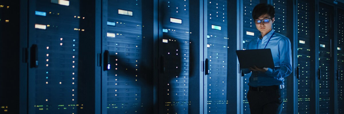 Cloud information architecture rep walking through modern data center