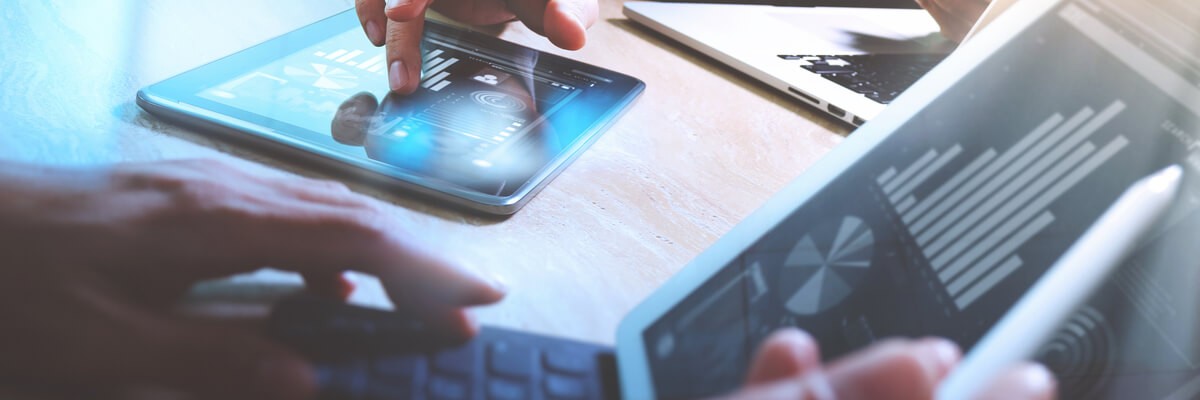 Close up of financial information on devices