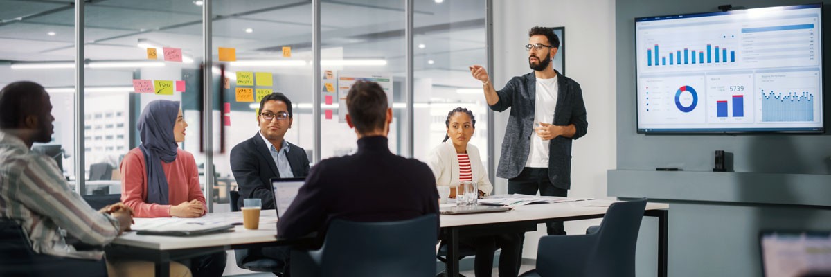 View of business professionals in financial analytics meeting