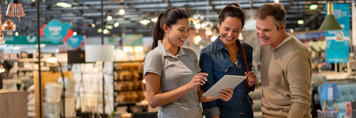 Family at Room & Board home furniture store