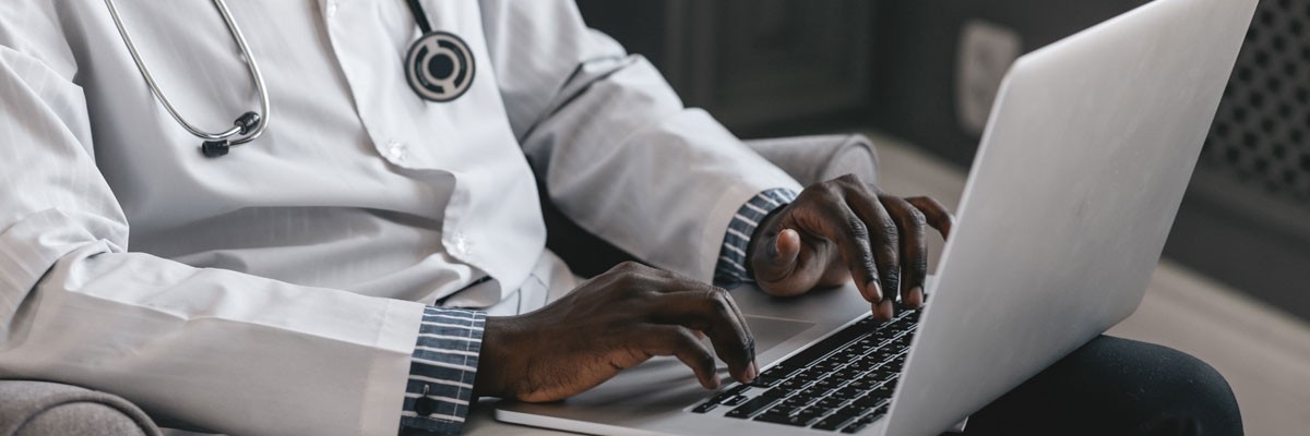 Easily create and work with visual concepts Retail merchandiser reviewing design concepts off Apple devices as they are working on store displays and visual concepts.