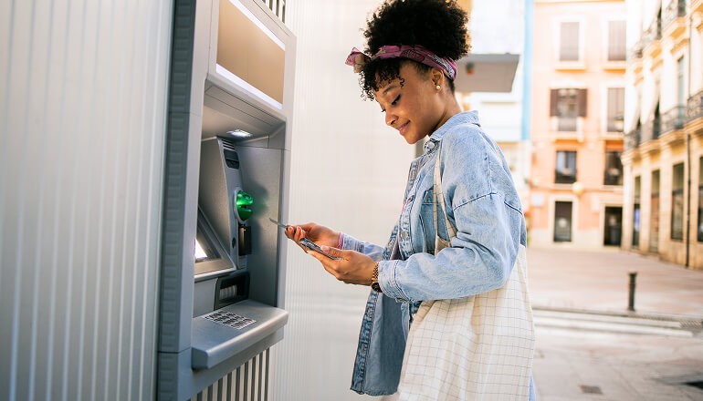 Girl using an atm