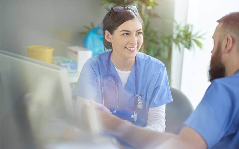 Two healthcare professionals in office
