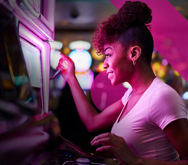 Woman playing slot machines