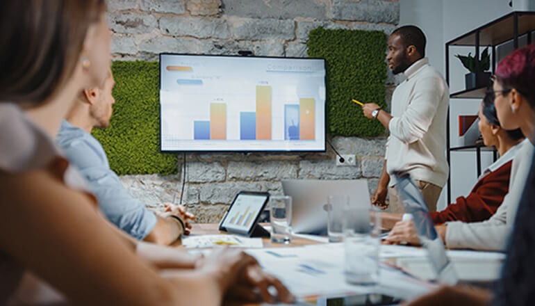 his solution by Thales provides organizations with robust controls to improve their security posture while maintaining necessary compliance. Work group having collaborative meeting. Thales, CipherTrust, data security, data management, data compliance