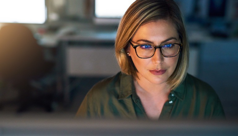 Woman working at desktop