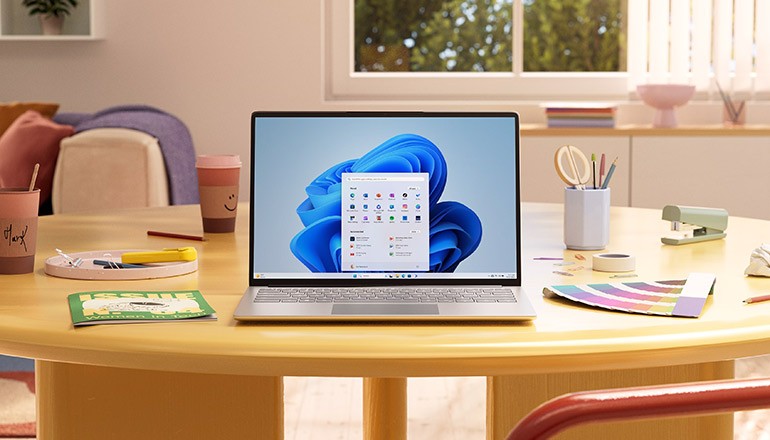 Team member in meeting smiling Streamline Your Adobe Purchasing Experience