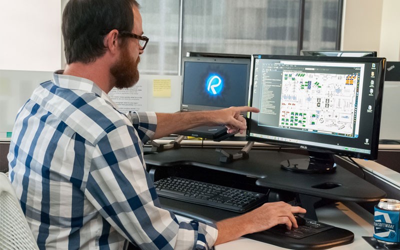 Business man working on computer using Bluebeam solution