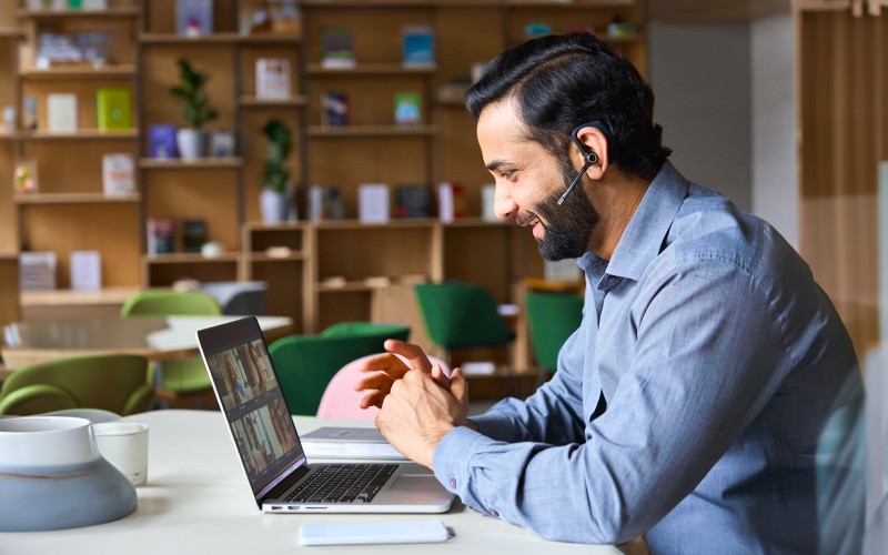 CallTower offers key business integrations that cater to various organizational needs Professional using laptop