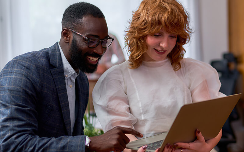 Teammates working together at the office