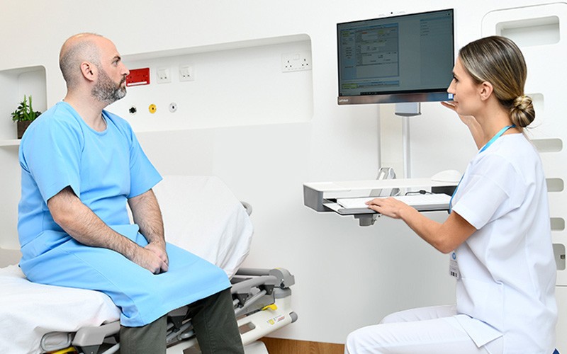 Nurse talking to patient