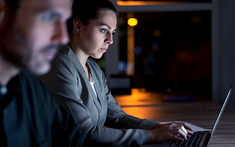 Ransomware protection and recovery Two person working together