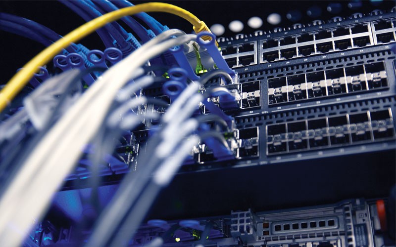 Government technology solutions for cybersecurity Close-up of server wires