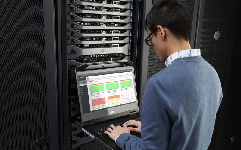 This is why prioritizing the security and dependability of your IT environments is crucial Dell technician managing server room