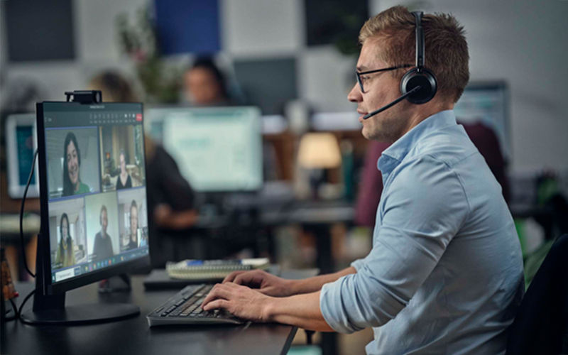 Man using EPOS Impact headset