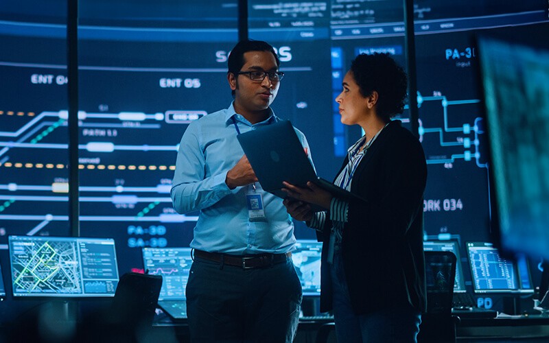 Teammates working together at the office